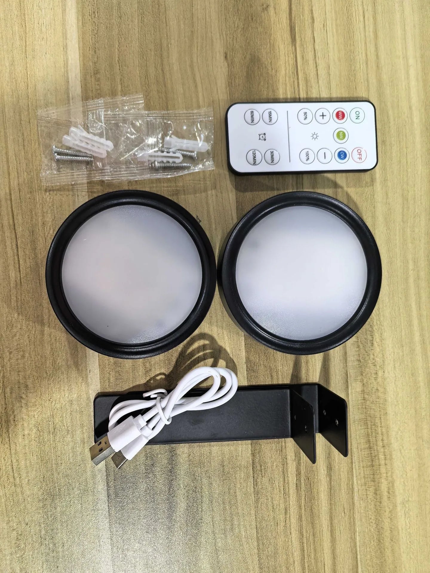 Wireless LED painting lamp with magnetic charging and remote control in black, white or gold finish