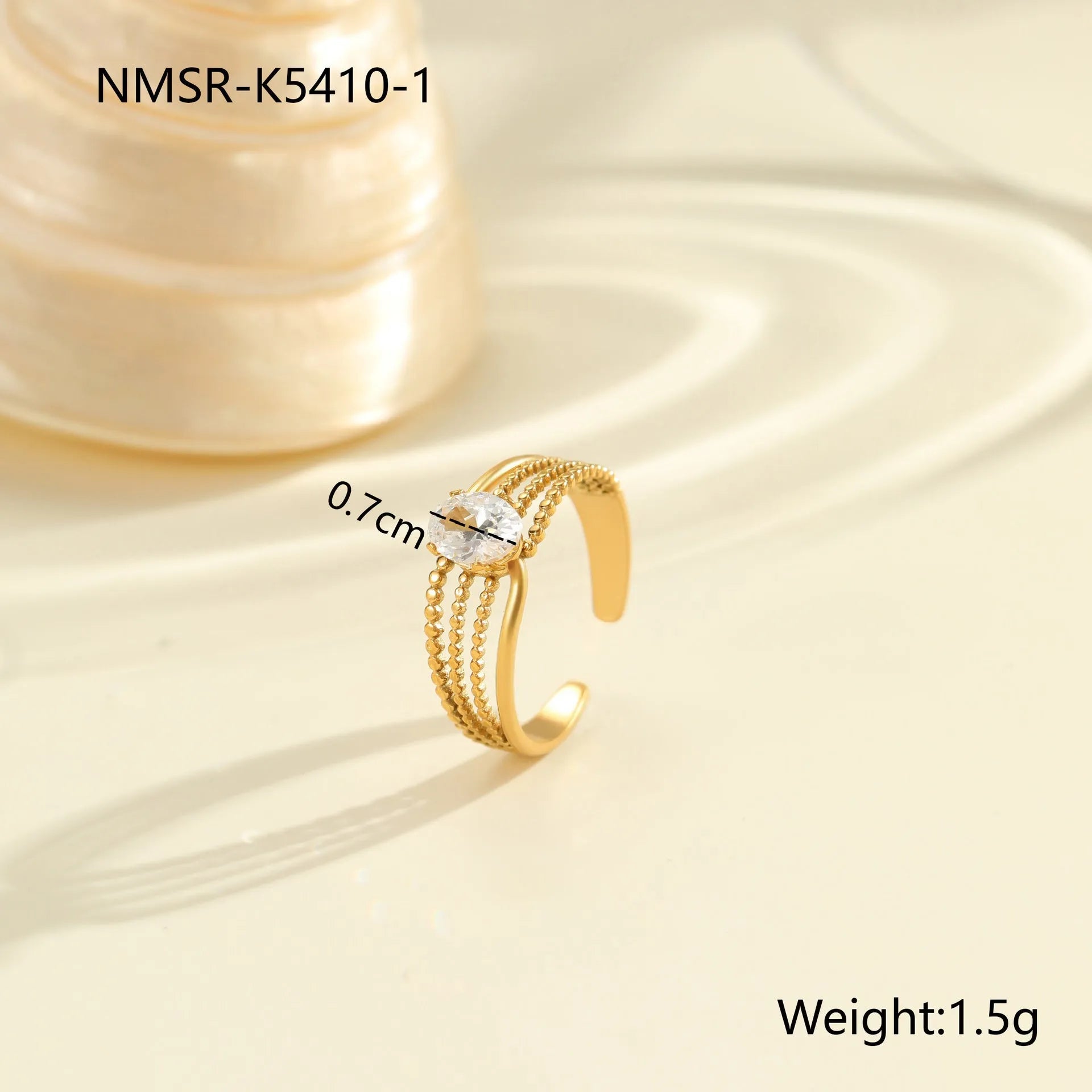 Gold electroplated stainless steel ring with zircon geometric design and open mouth adjustable fit