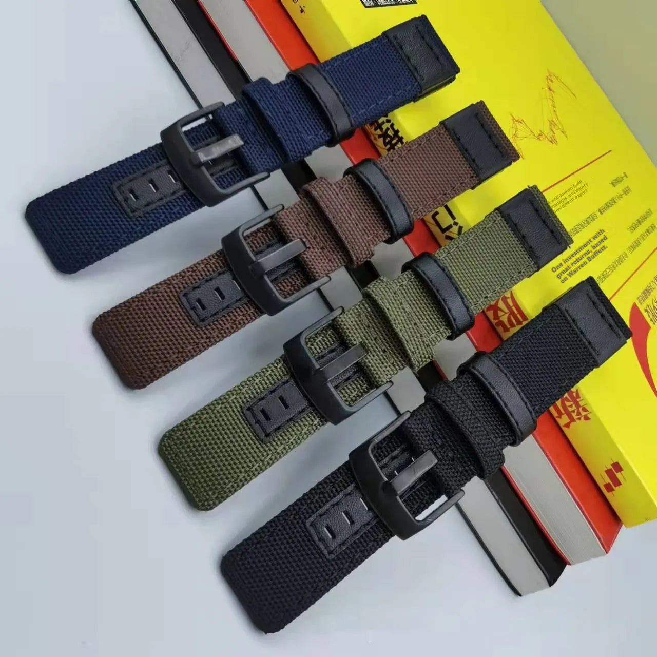 Oxford cloth watch strap shown in multiple colours including camouflage, army green, and black, with size options for 20mm, 22mm, and 24mm widths.