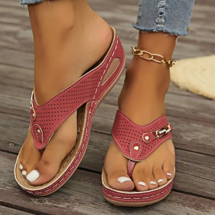 Women's retro flip-flop sandals in beige, showing PU upper and textured sole, on a plain background.