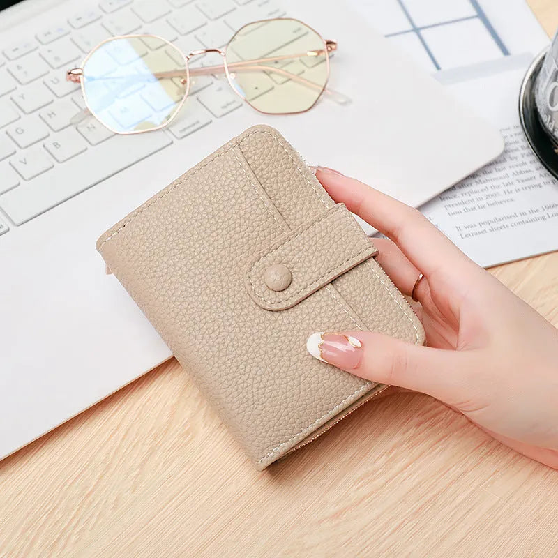 Ladies' short wallet with lychee pattern showing two-fold design in beige, pink, black, and red colour options