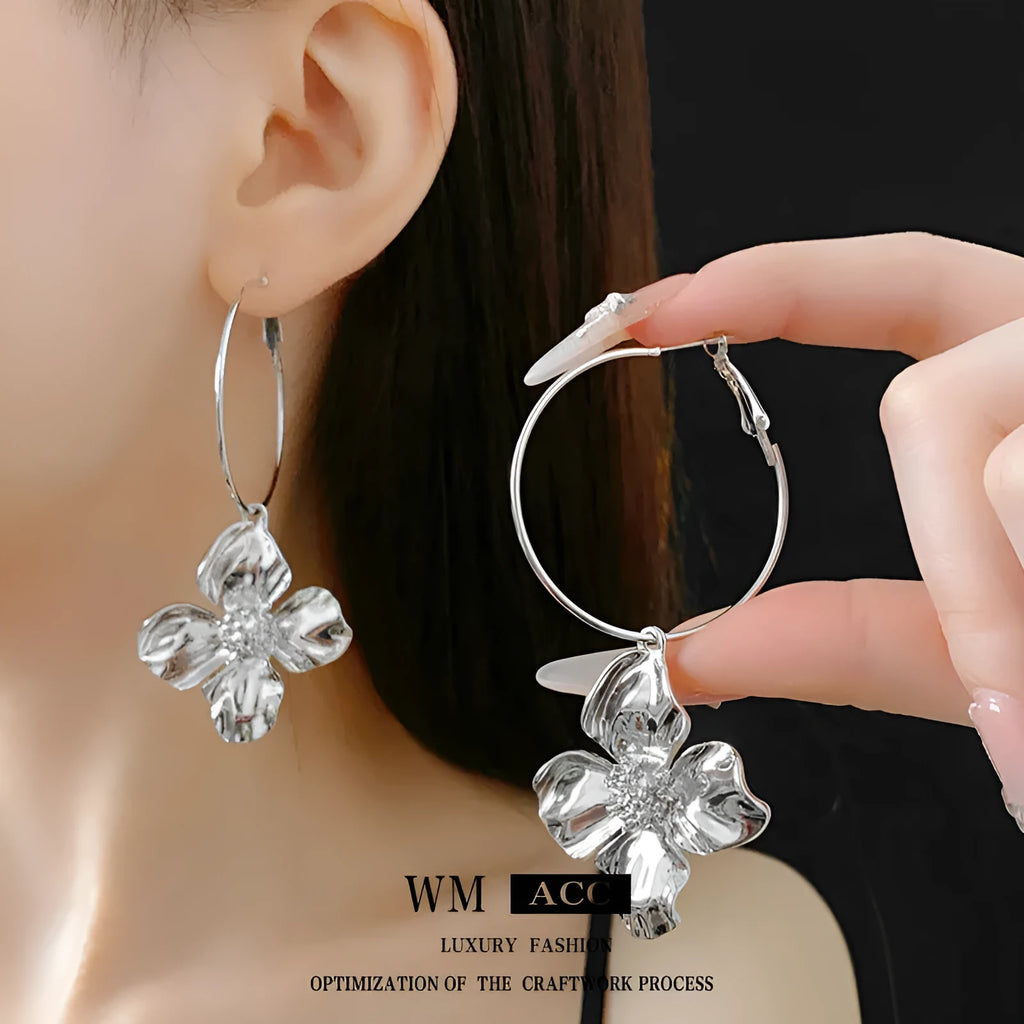 Silver Needle metal flower earrings in geometric design with electroplated gold or silver finish