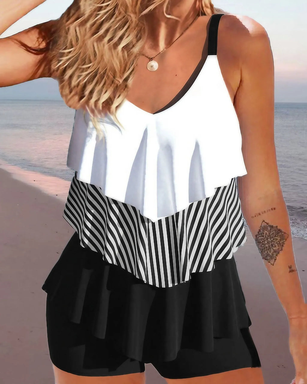 Women's backless bikini swimsuit with spaghetti straps and ruffle detailing