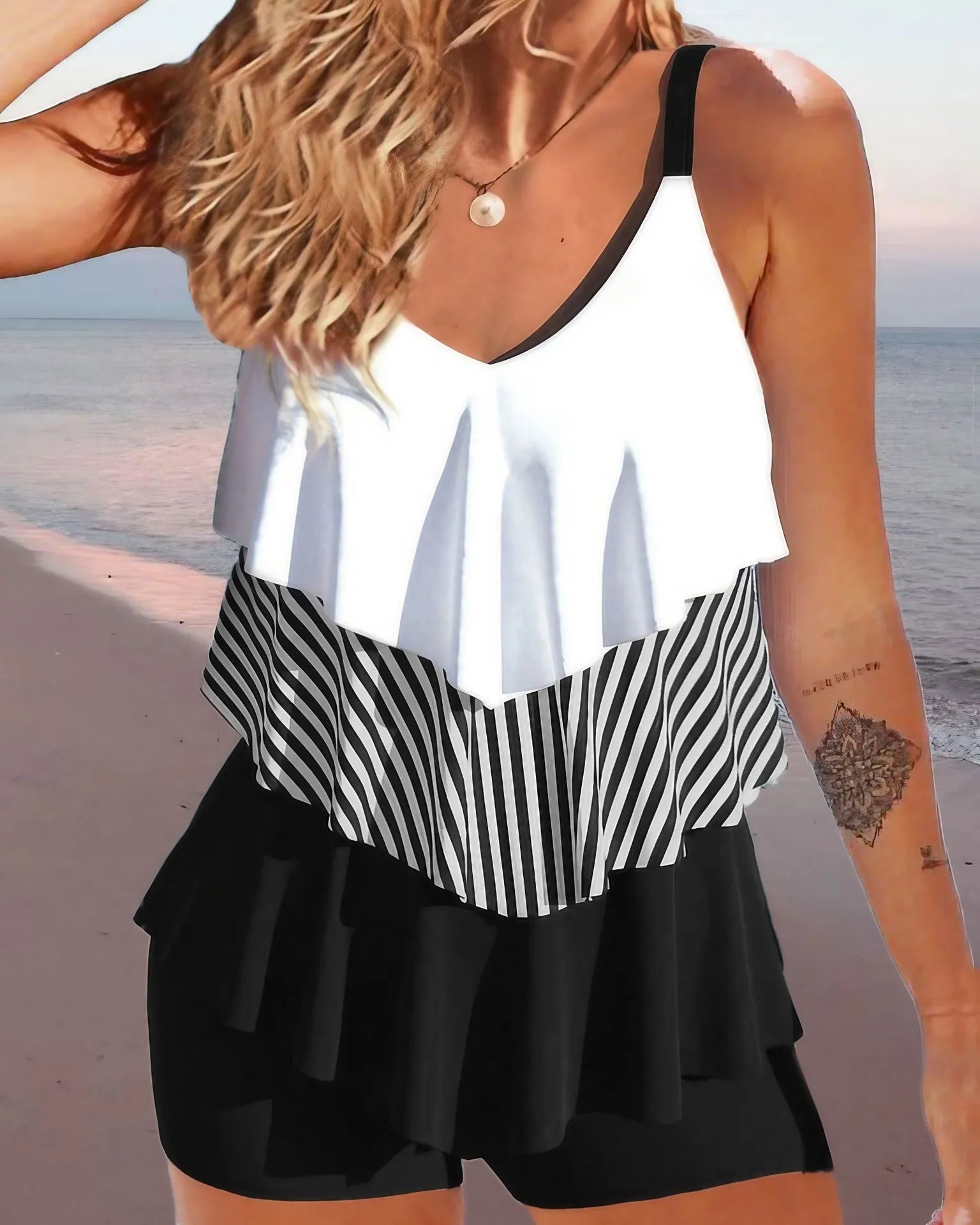 Women's backless bikini swimsuit with spaghetti straps and ruffle detailing