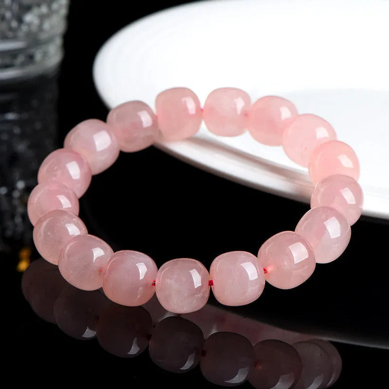Pink crystal barrel bead bracelet with 8x10mm geometry pattern design