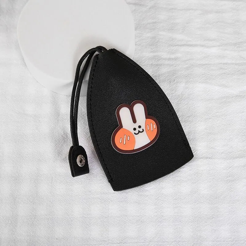 Cartoon pull-out car key case in PU leather with colourful designs measuring 14 x 7.5 cm