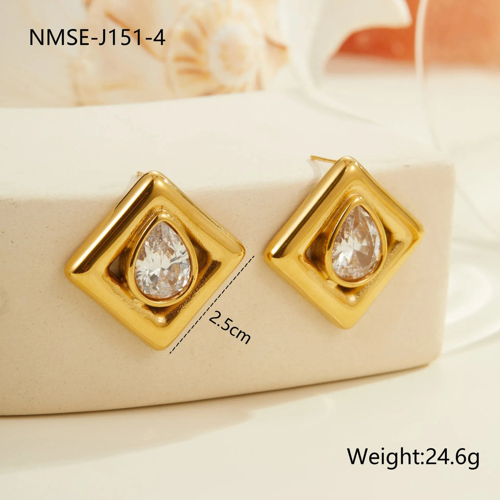 Pair of gold-coloured stainless steel stud earrings with geometric water drop zircon stone inlays.