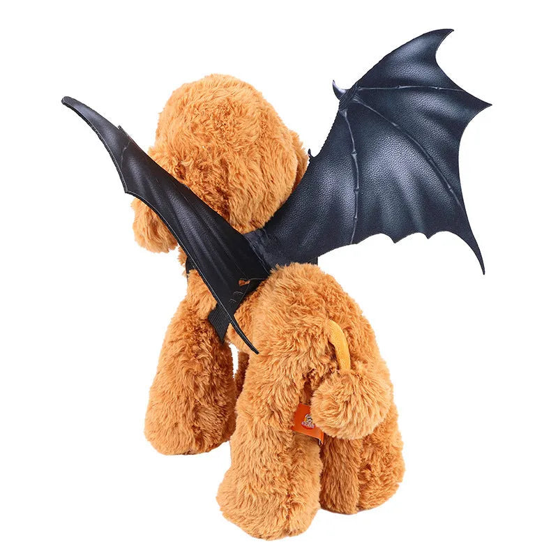 Black cloth bat wings pet costume accessory shown in three sizes for Halloween