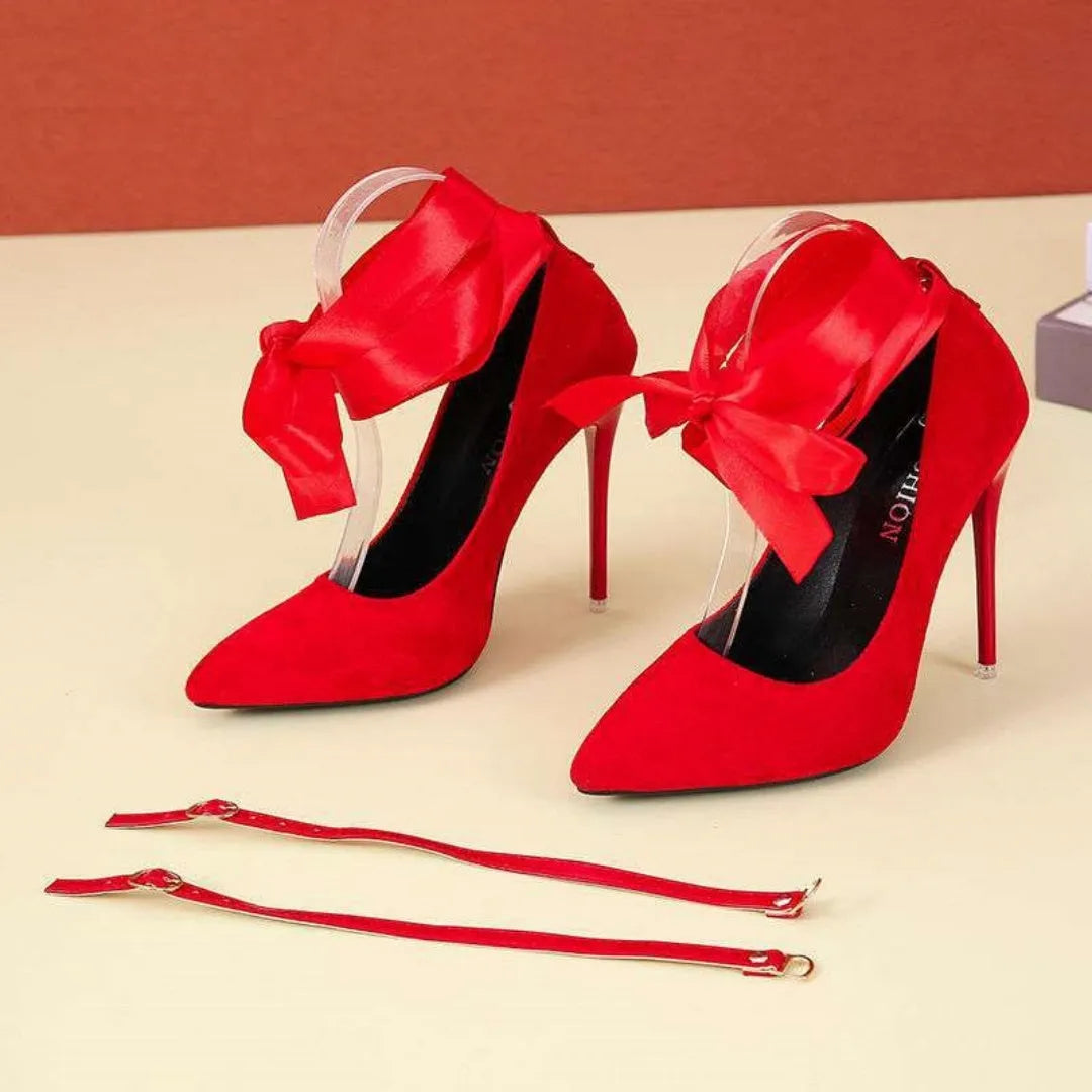 Women's black pointed toe platform high heels with a lace ankle strap and a thin shallow mouth design.