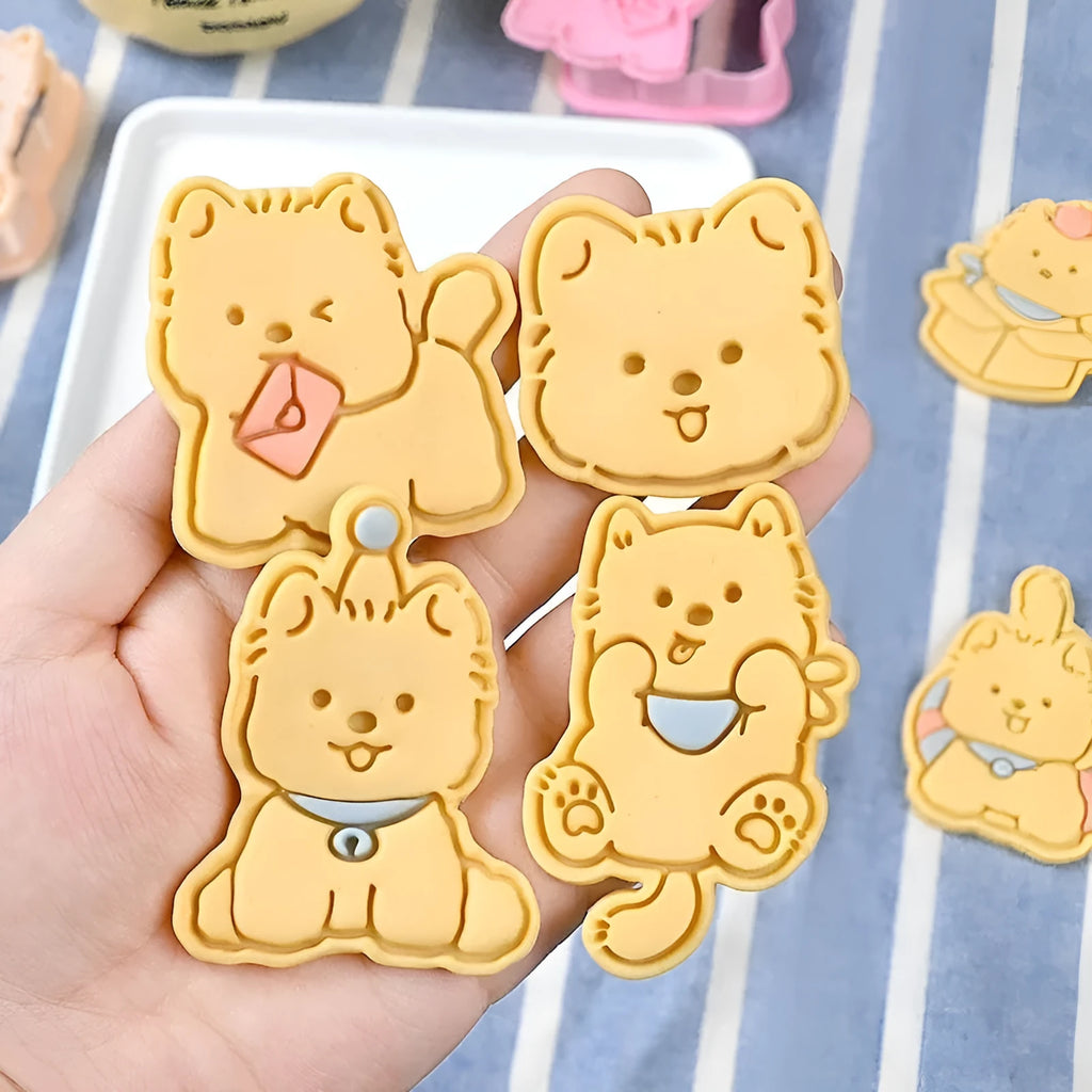 3D plastic biscuit mould with cartoon dog shapes including puppy head and birthday hat