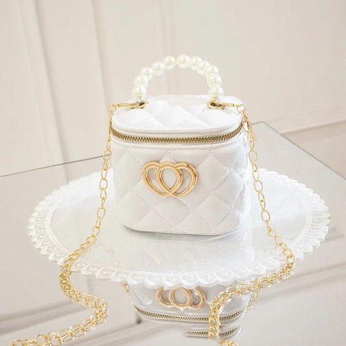 PVC bucket-shaped gel bag with a heart pattern, shown in one of seven available colours.