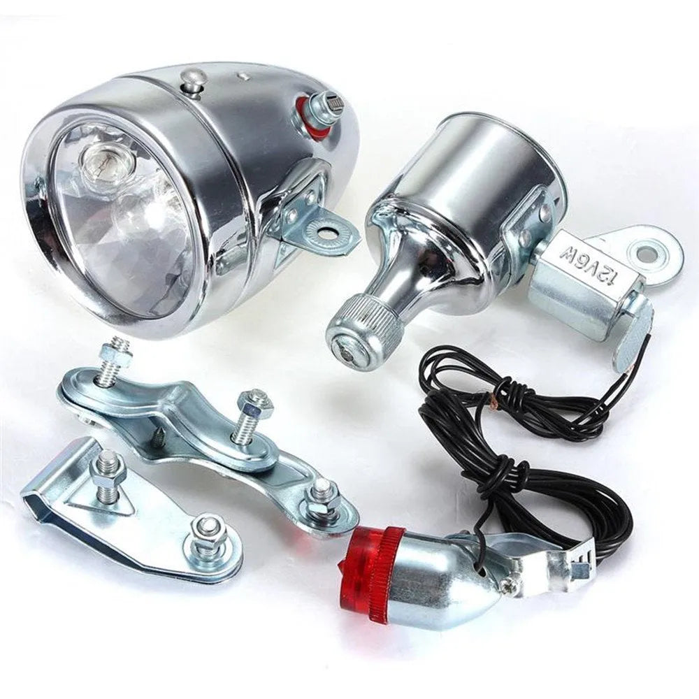 Silver bicycle dynamo light generator kit for front fork or rear frame mounting with friction power generation