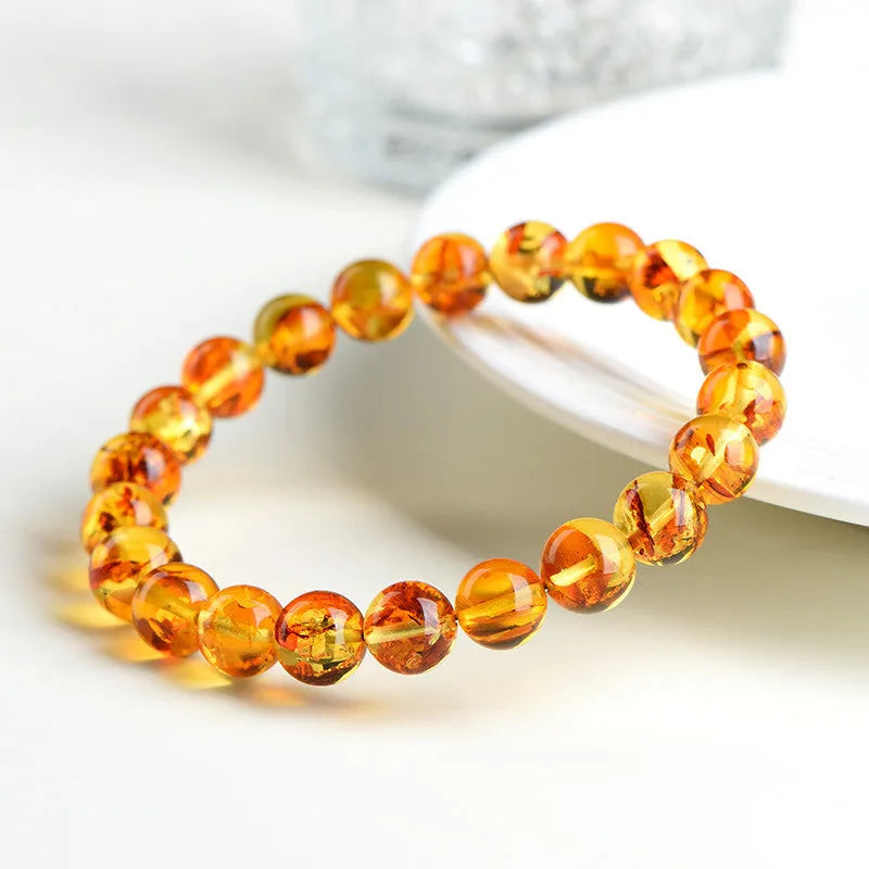Natural yellow piebald amber bracelet with geometric beads in three size options