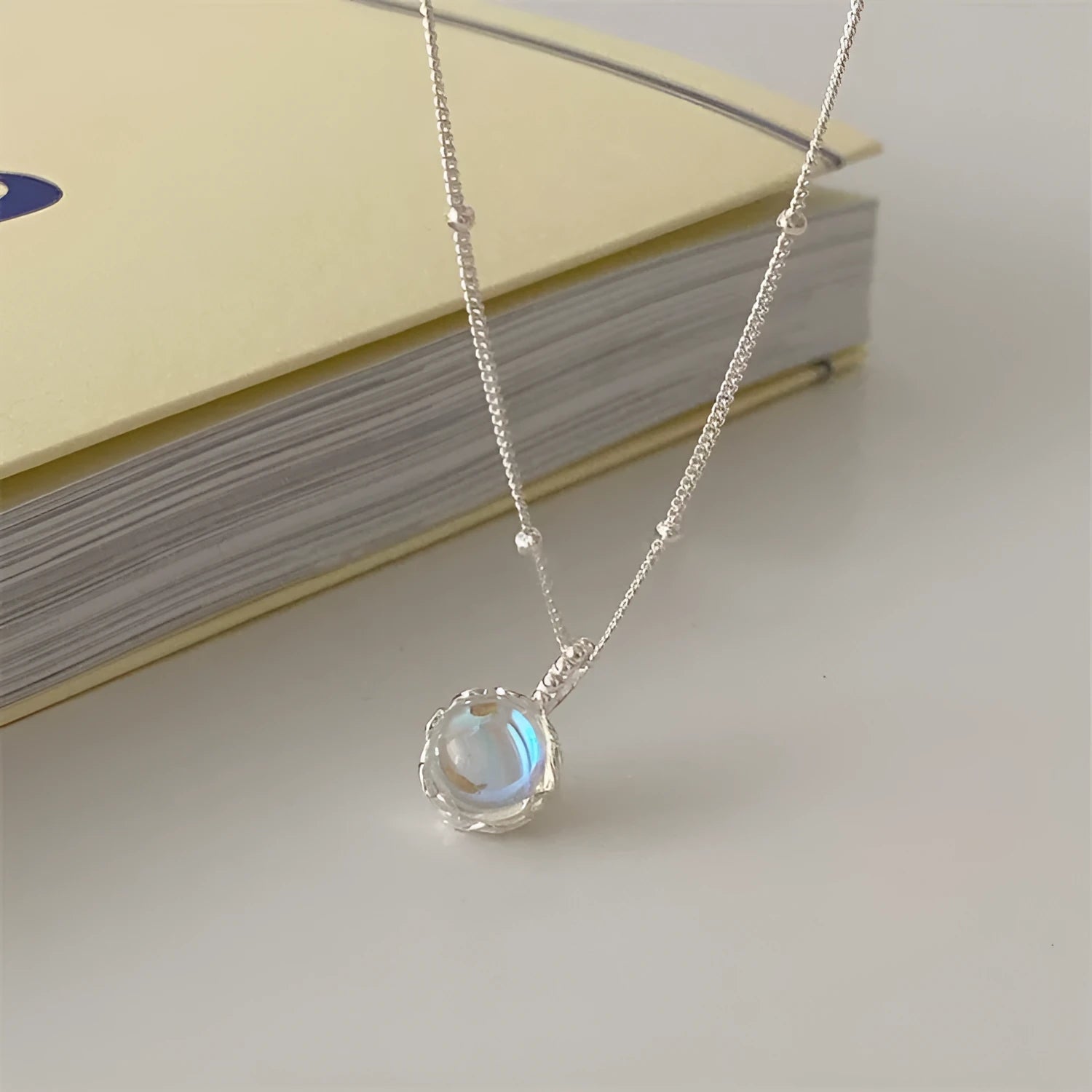 Silver geometric ornamental stone necklace on curb chain with adjustable 41-50cm length