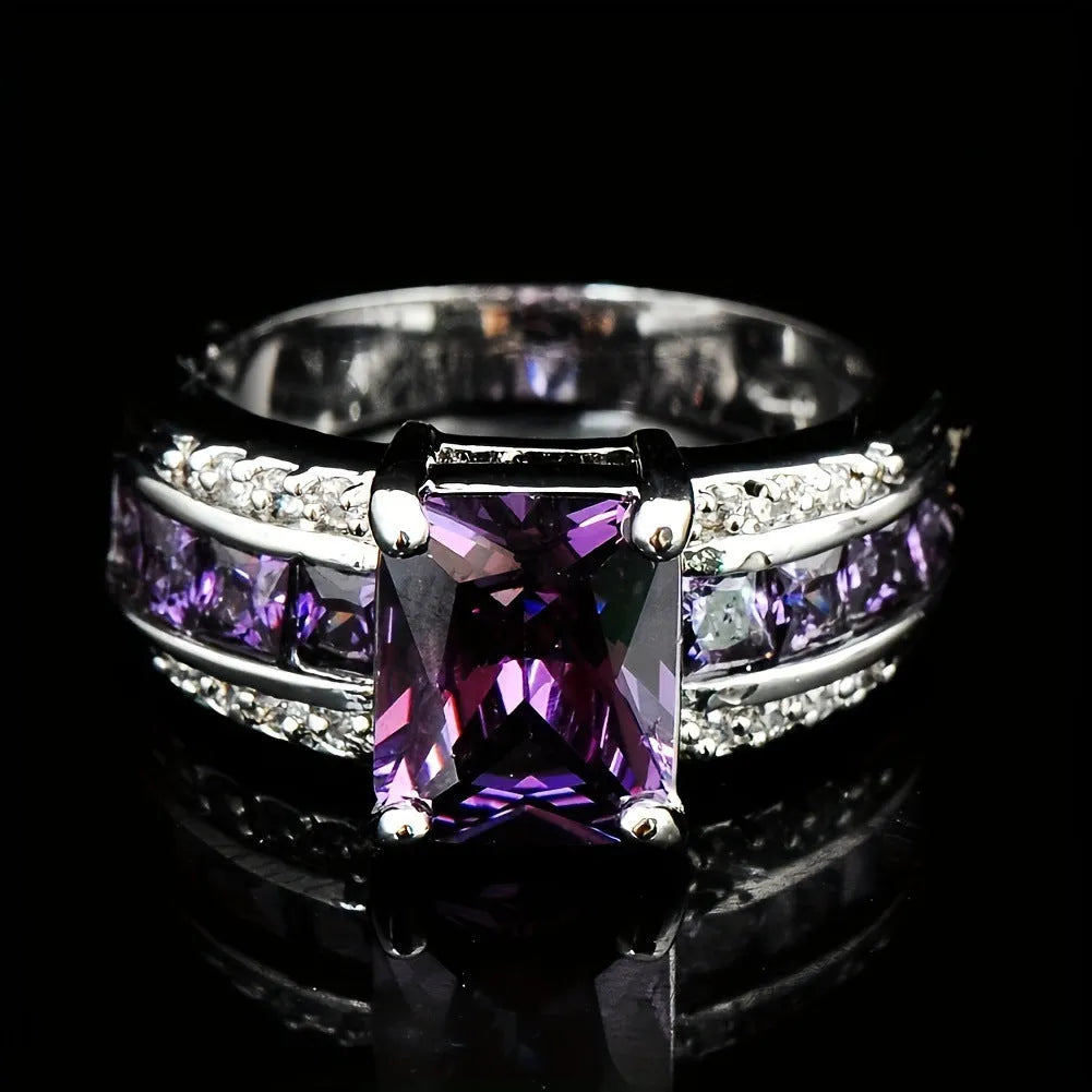 Personalised zinc alloy ring with diamond treatment in sunflower blue or square purple and blue zircon designs.