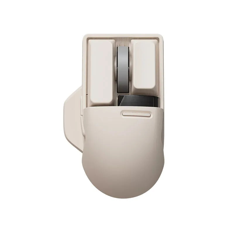 Xiaoqiao tofu colour wireless mouse with seven buttons and a scroll wheel on a desk.