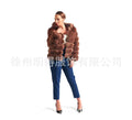 A woman's loose-fitting artificial fur hooded coat in street fashion style.