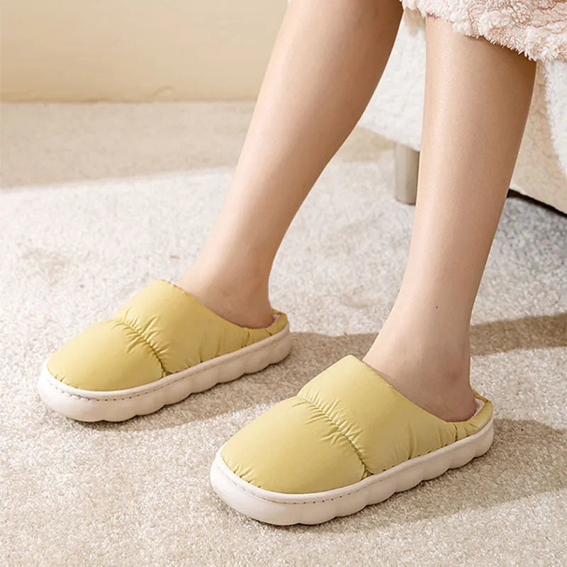 Blue plush indoor slippers with thick rubber sole and artificial fur lining