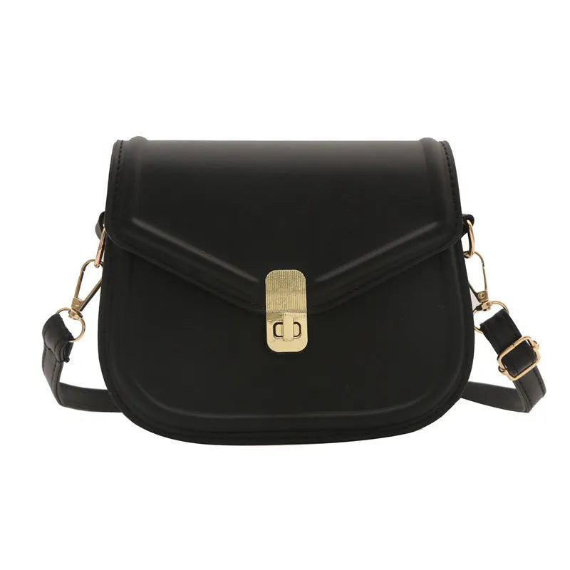 Soft PU shoulder messenger bag in horizontal square clamshell shape with niche texture.