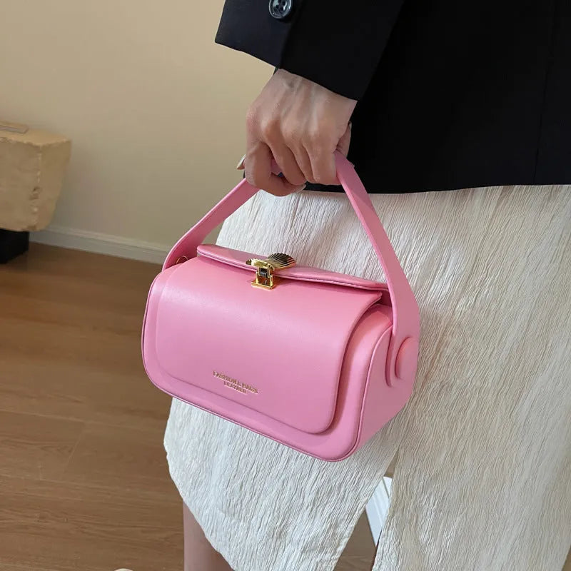 Women's personalised PU leather messenger bag with embossed lettering in beige colour