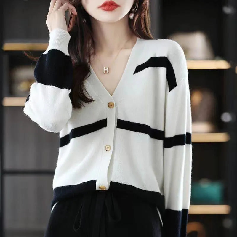 Women's striped V-neck knitted cardigan with 3D pattern in slim fit silhouette