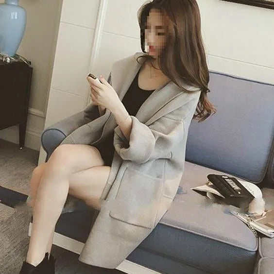 Plus size women's loose thin cotton coat with long sleeves and lace trim.