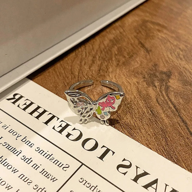 Copper women's ring featuring a creative Chinese butterfly design, available in multiple colours.