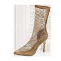 Gold mesh pointed toe stiletto high heel sandals with an oversleeves design on a rubber sole.
