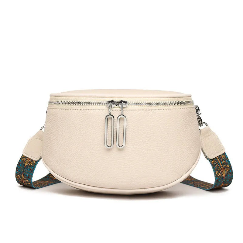 Women's saddle-shaped PU leather messenger bag in green colour with cross-body strap and exterior pocket