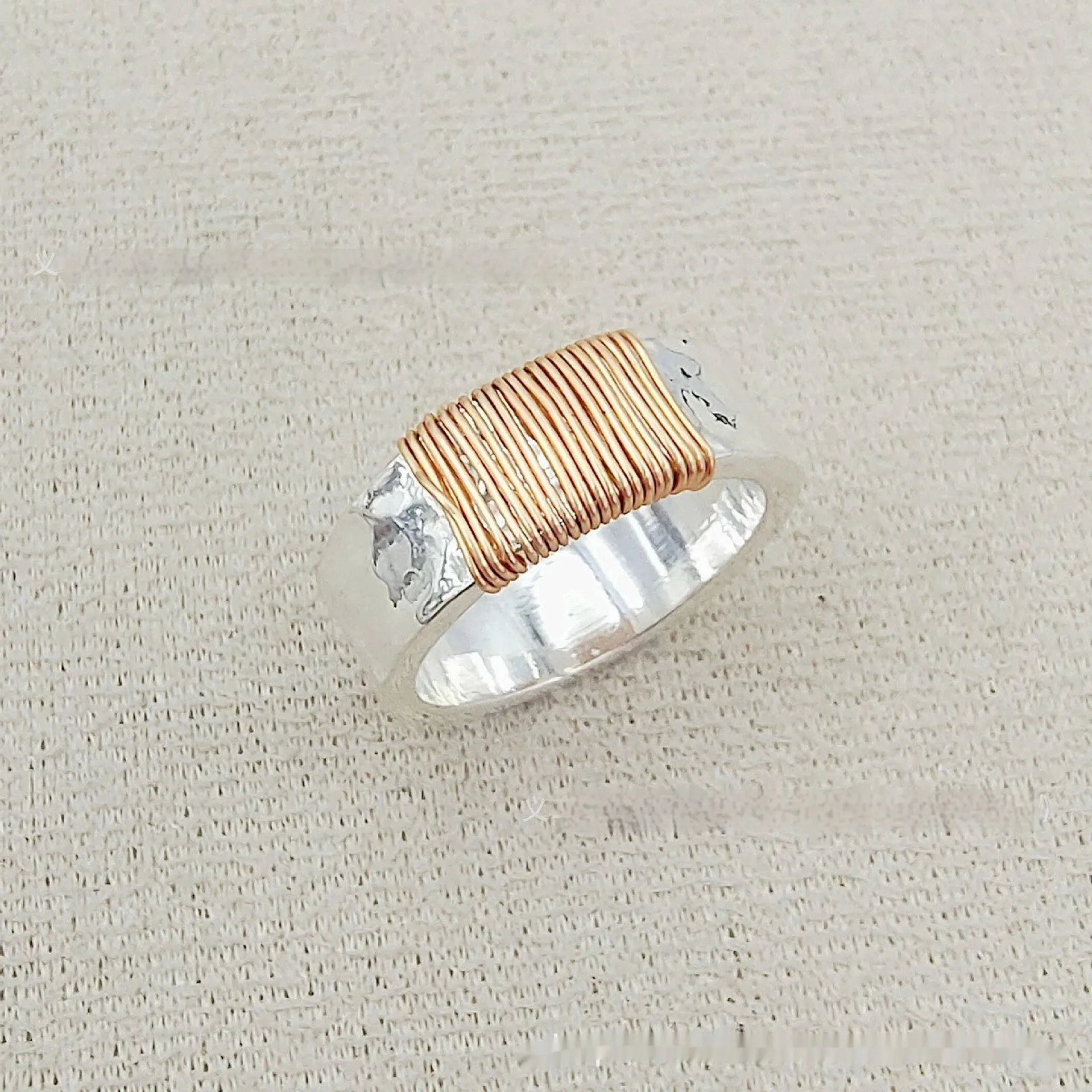 Geometric wide face copper bracelet with irregular coil design in silver golden colour
