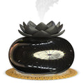 Pure black USB-powered aromatherapy humidifier with round design and ultrasonic mist output