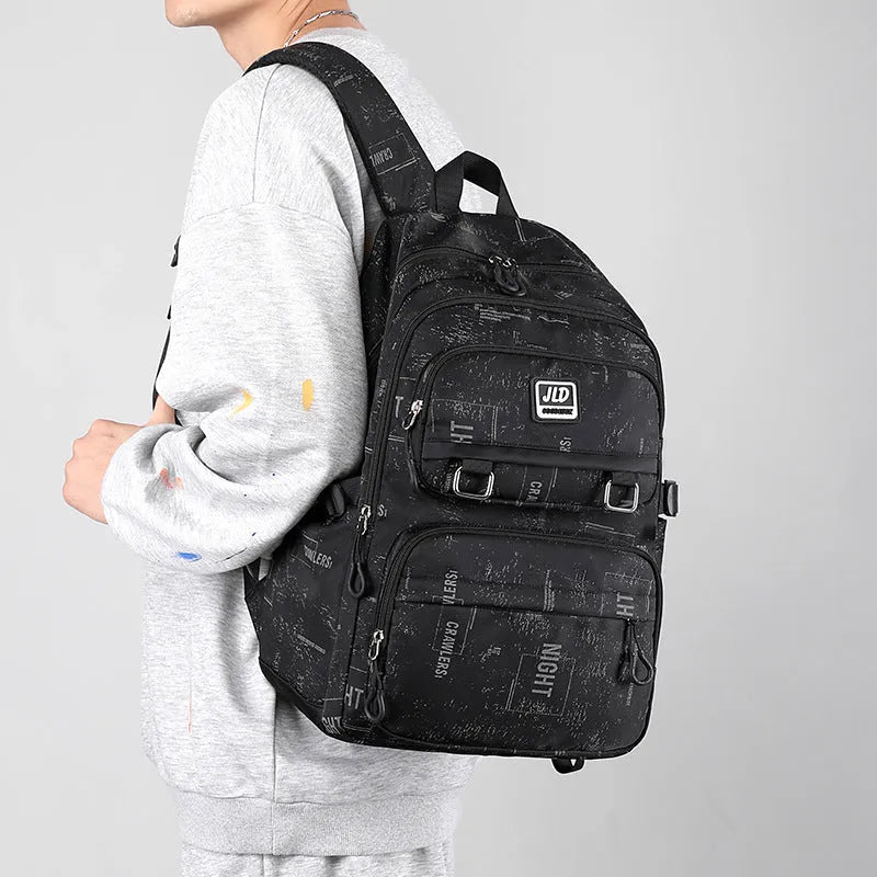 Large purple girls' nylon school backpack with a physiological curve backpanel on a white background.