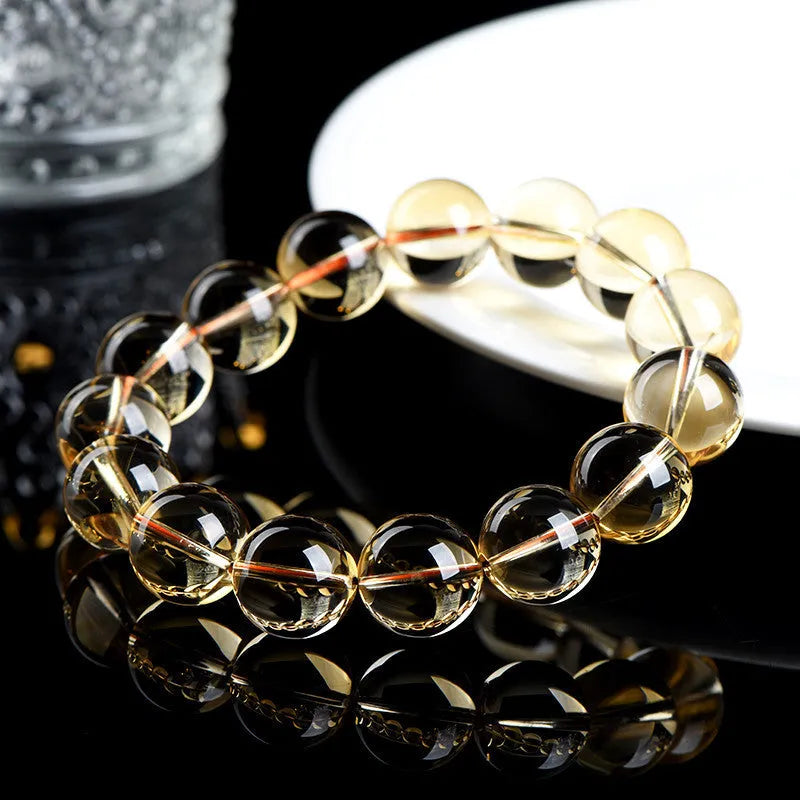 Natural citrine scattered bead and ball bracelet shown in selectable 7A or 6A grade colour.