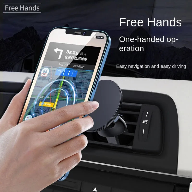 Black aluminium magnetic car phone holder clipped to car air vent
