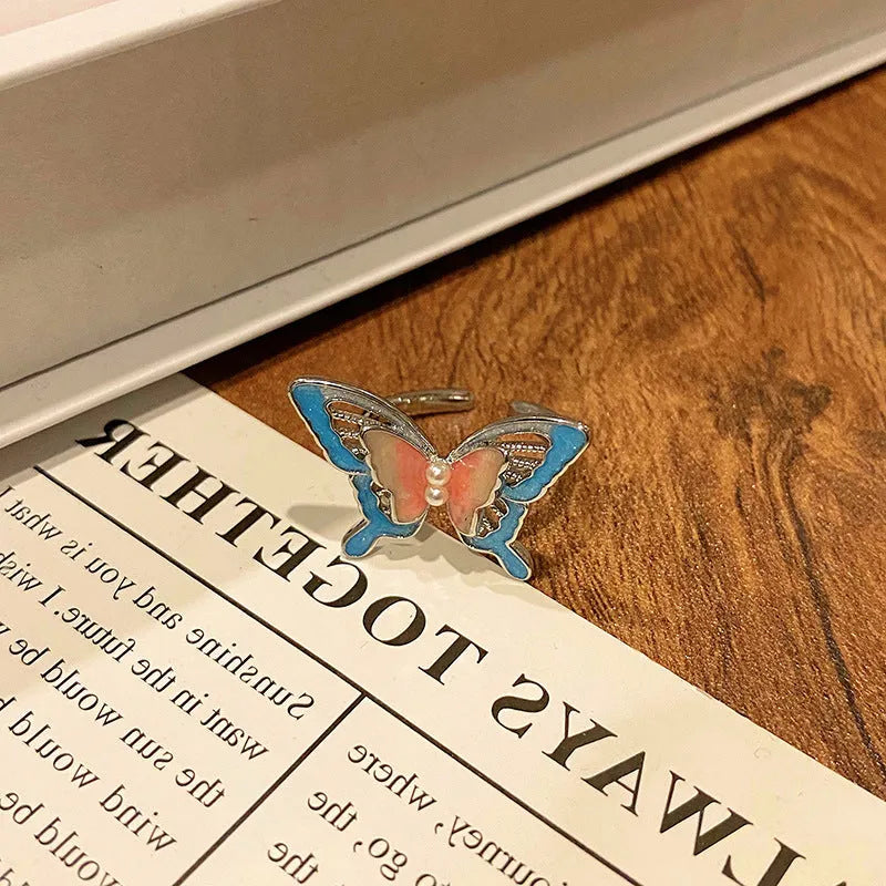 Copper women's ring featuring a creative Chinese butterfly design, available in multiple colours.