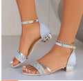 Women's black plus size Roman style sandals with rhinestones, buckle strap, and fish mouth toe.