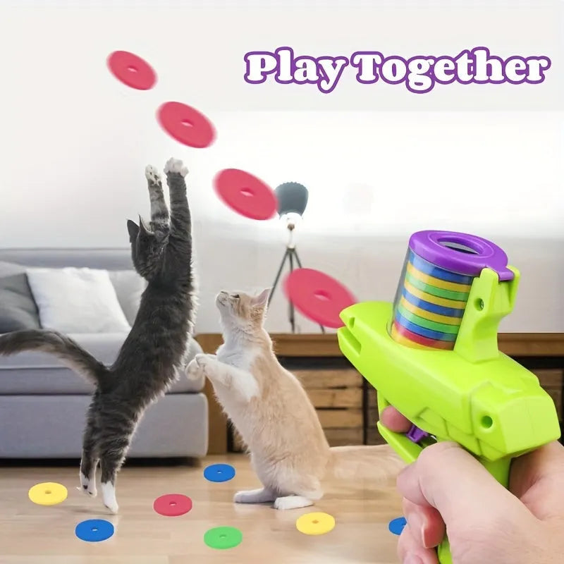 Green battery-free cat toy launcher with foam discs for interactive indoor play