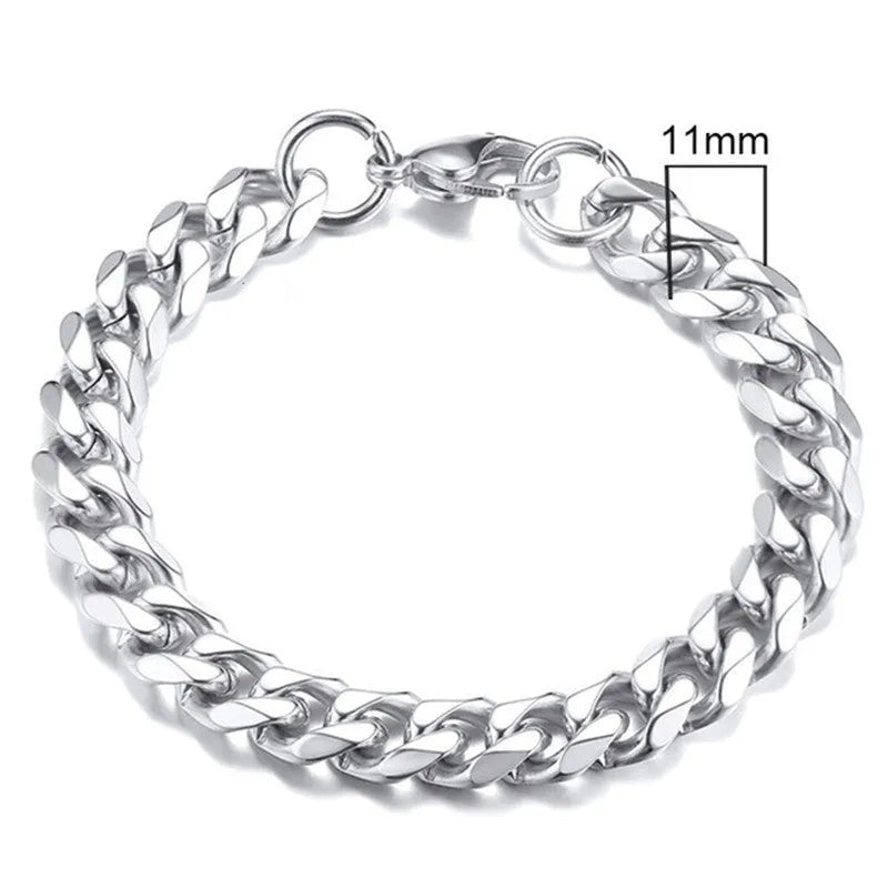 Six-sided geometric link metal bracelet in gold colour on a wrist.