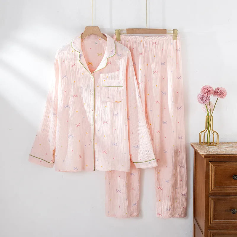 Women's cotton pajama set showing long sleeves and matching trousers in simple casual style