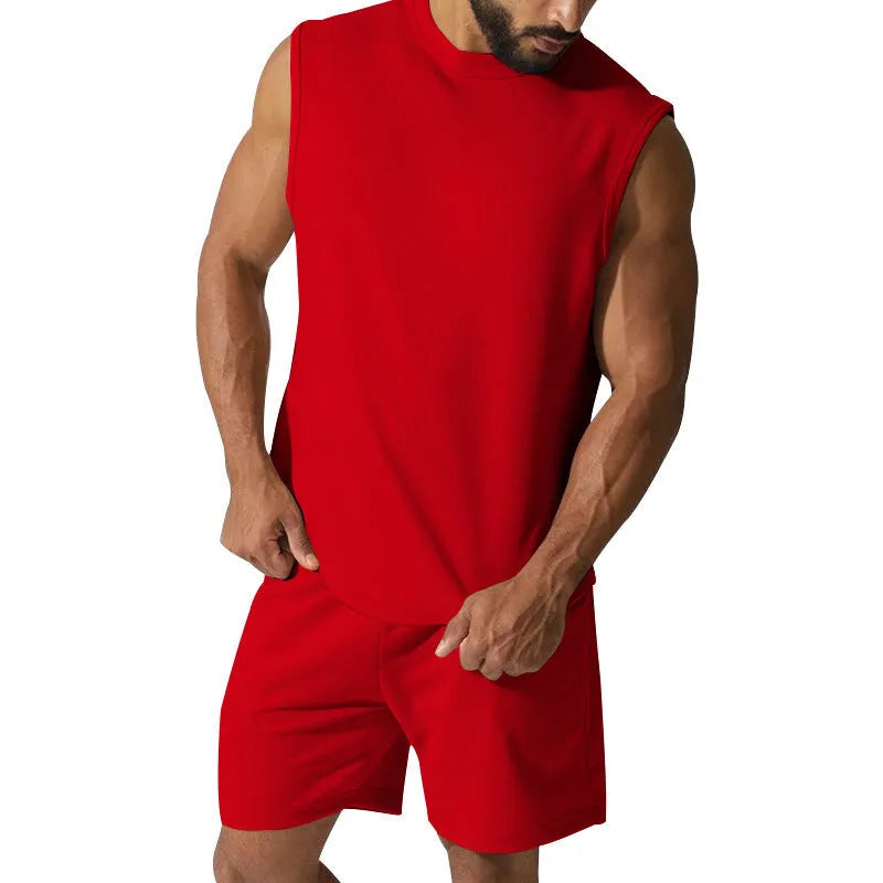 Men's sleeveless cotton blend sports top and shorts set in a solid colour.