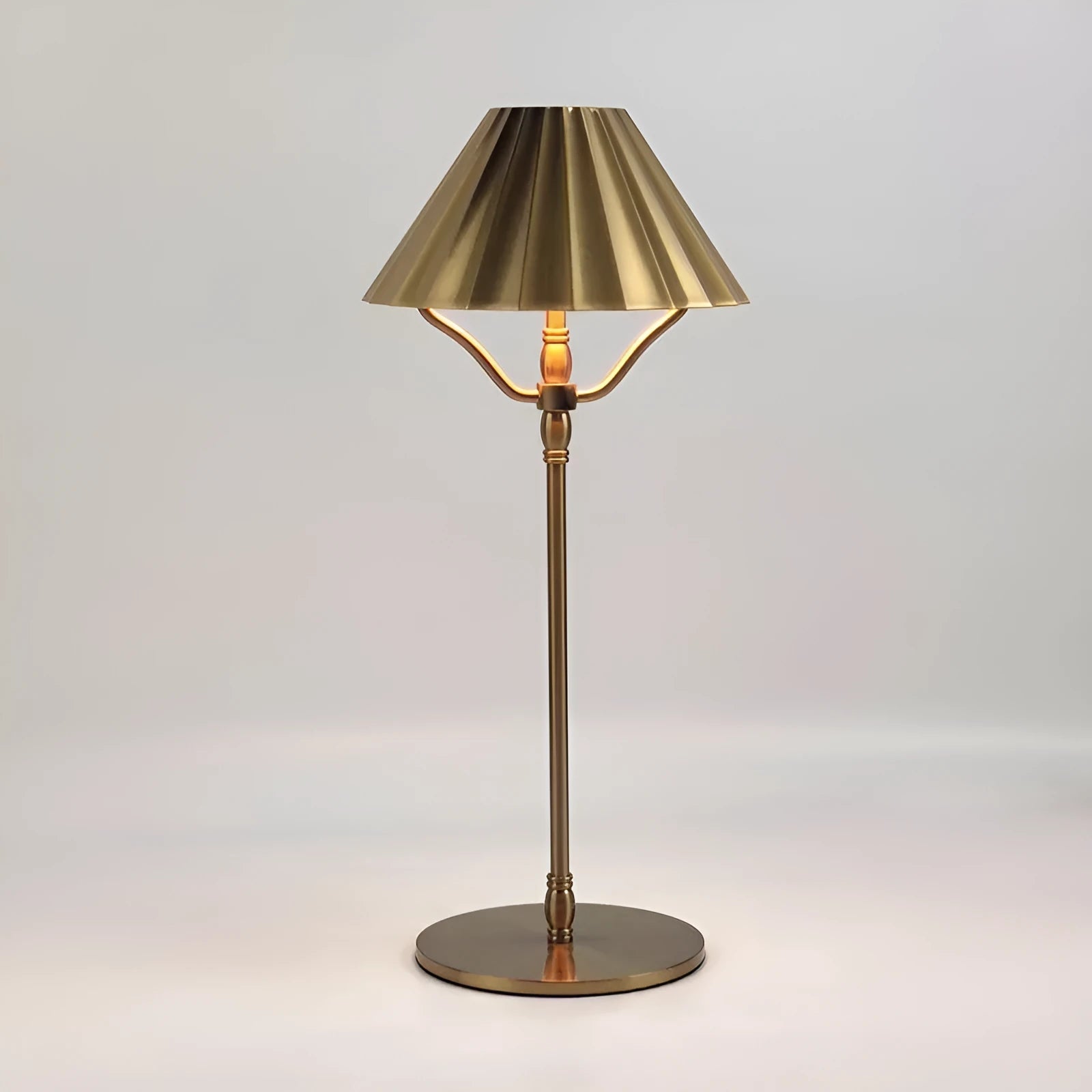 Gold-coloured rechargeable desk lamp with touch control and Type-C charging port.
