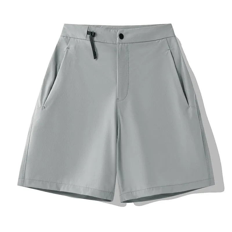 Men's quick-drying nylon spandex sports shorts in khaki colour with elastic waist and 3D cut design.