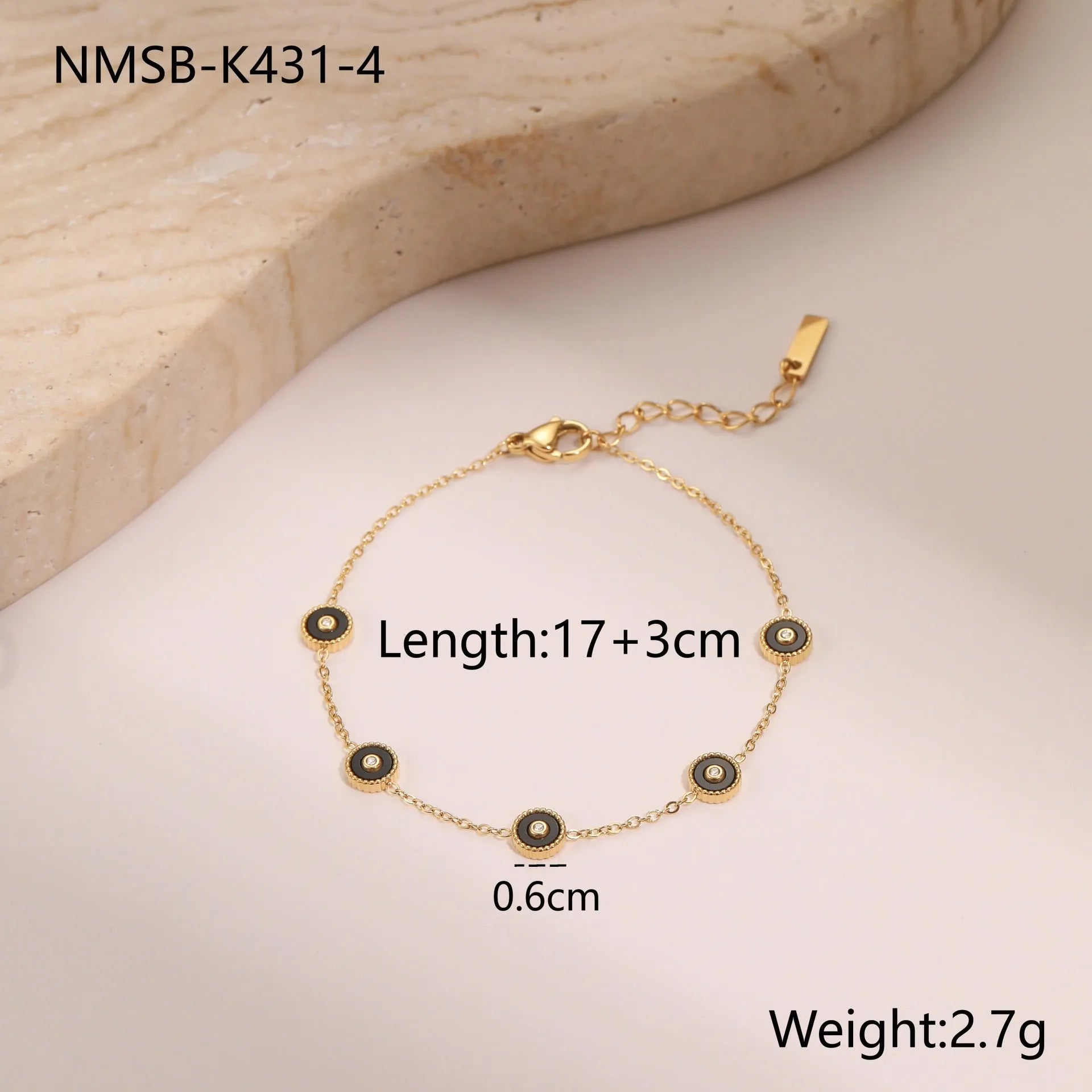 Geometric fritillary design stainless steel bracelet with 18K gold plating and matching necklace