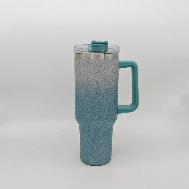 Large stainless steel vacuum insulated cup in a gradient colour option showing its height and simple style.