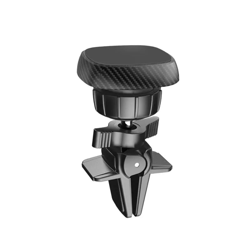 Black magnetic car phone holder attached to a vehicle's air conditioning vent.