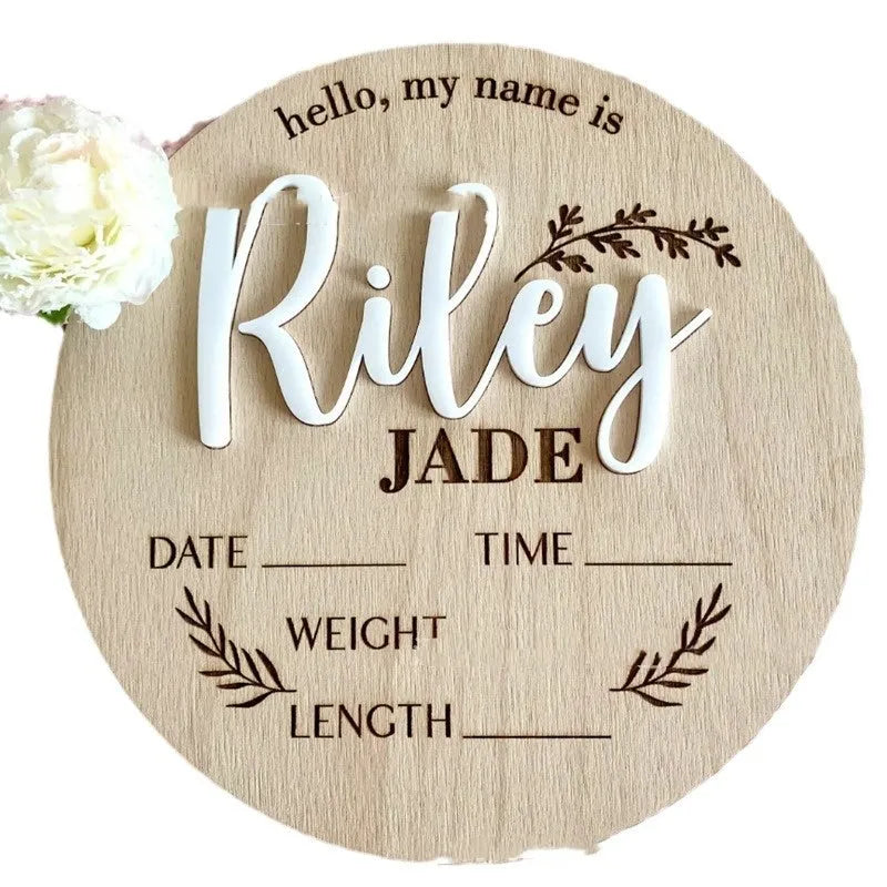 Square wooden baby name plaque showing birth information, 15 cm wide