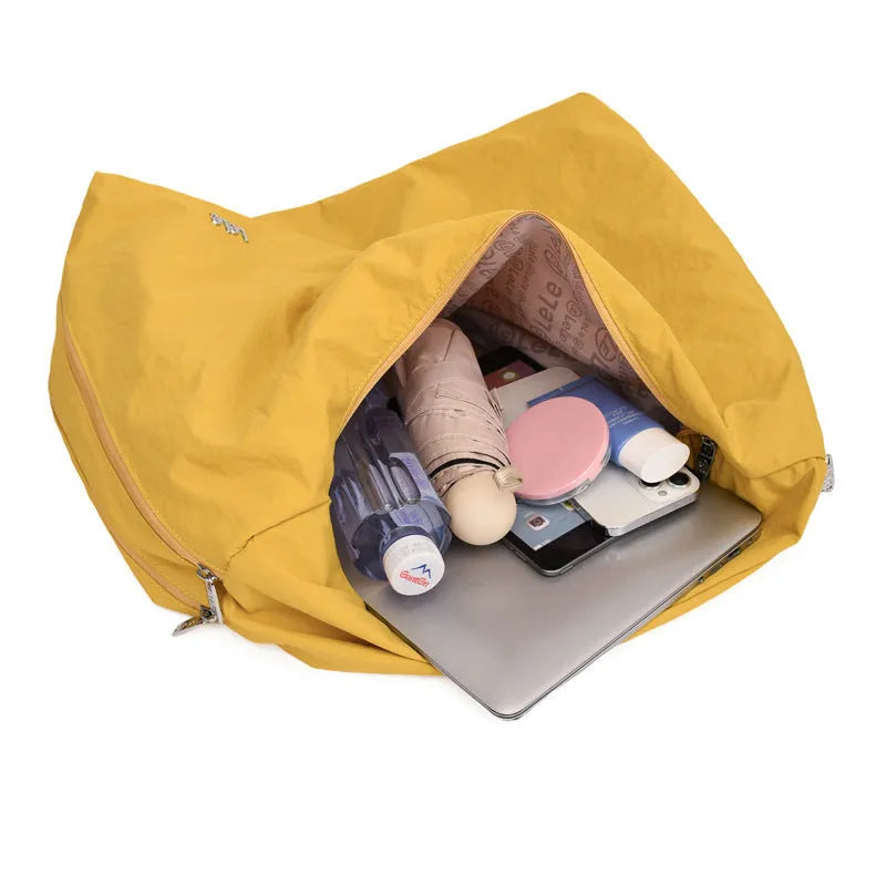 Women's heart-shaped nylon crossbody bag in black, yellow, khaki or blue colours
