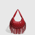 Black retro shoulder handbag with a tassel and an internal mobile phone compartment.