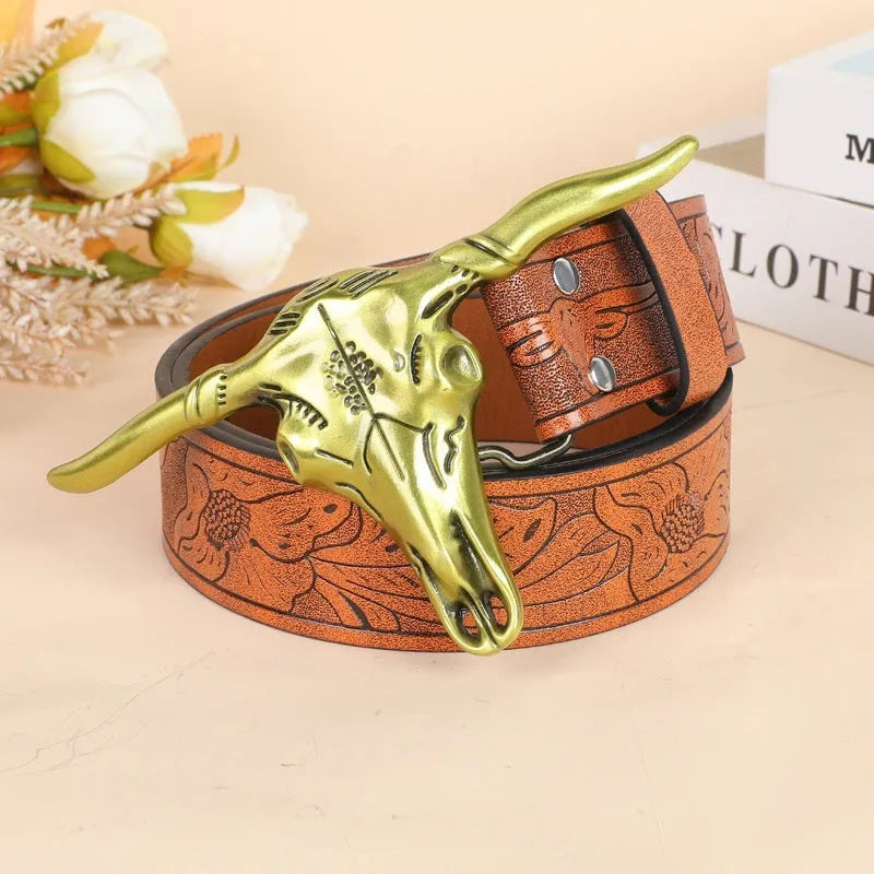 Men's brown belt with detailed cow head alloy buckle and imitation leather strap showing pin buckle closure