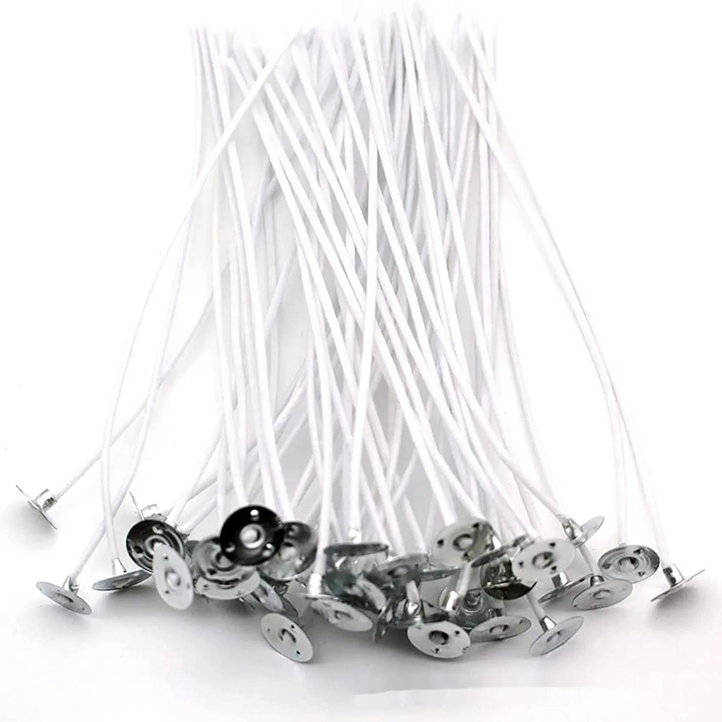 Close-up of white cotton candle wicks showing tightly woven texture and different lengths of 2.6cm, 6cm, and 8cm.